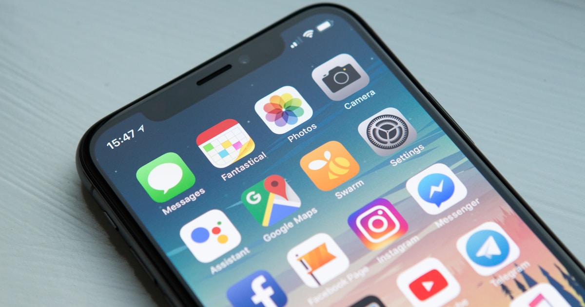 Person watching video content on smartphone with comfortable viewing experience
